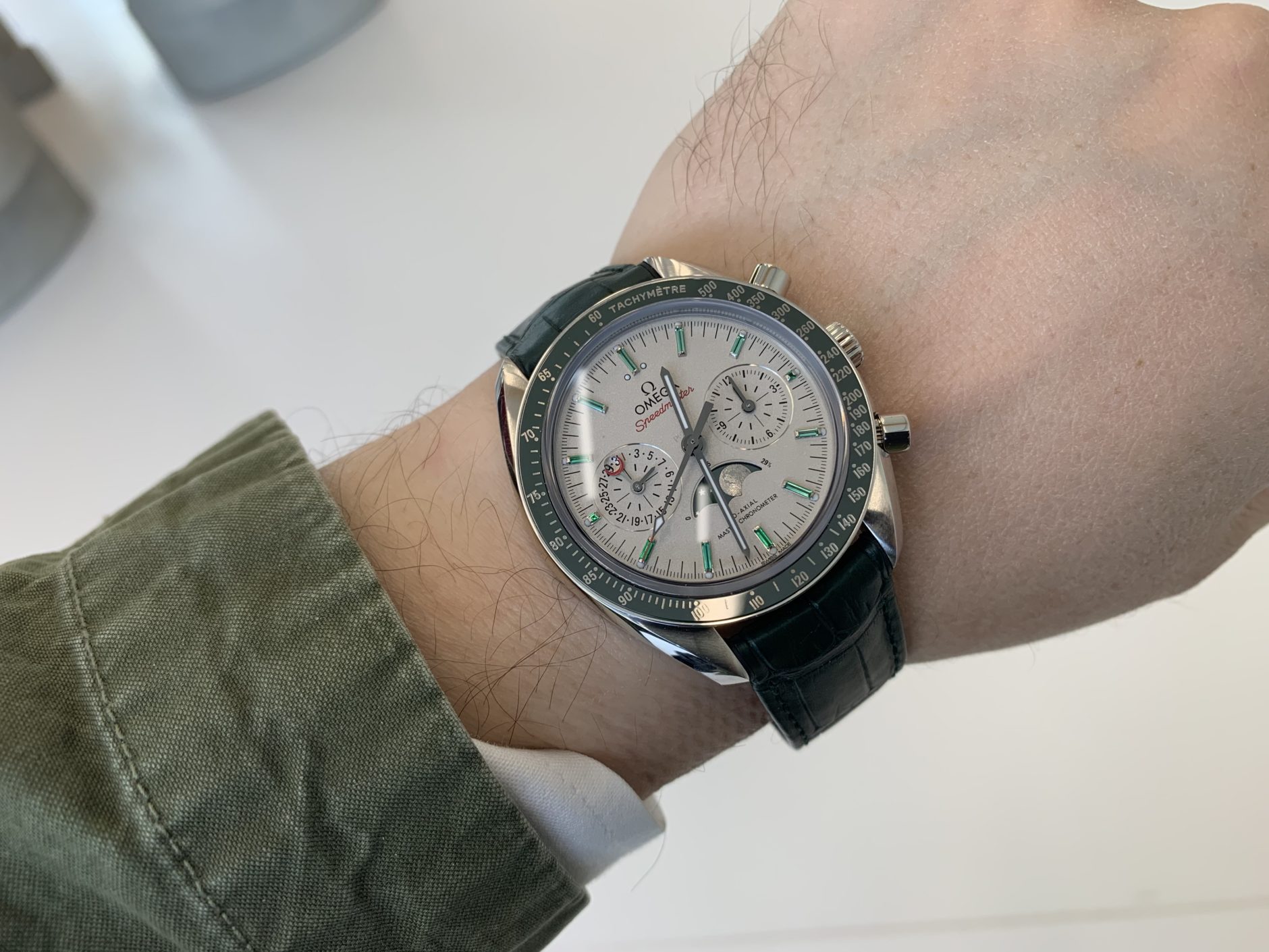 The silvery dials fake watches have moon phases.