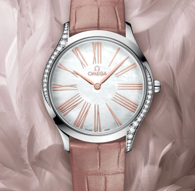 The pink strap copy watch has white dial.